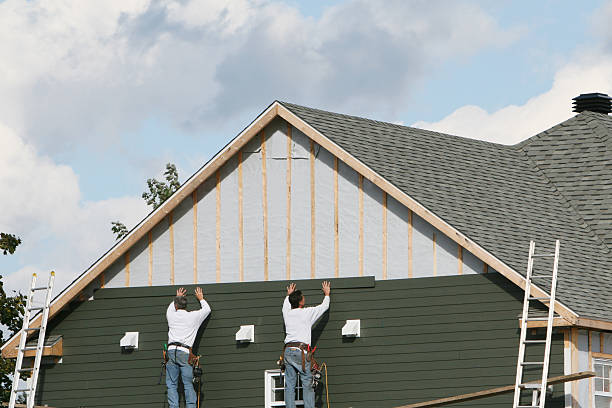 Professional Emergency Siding Repair technician working in Richmond, IL